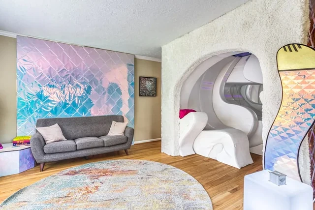 Living room and sculptural entrance at The Portal, 2023
